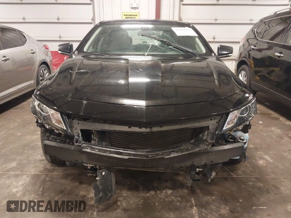 2018 Chevrolet Impala LT with VIN 1G1105S32JU122113, listed as a IAAI auction lot 42042957 with 152,895 mi miles and . Bid and sale history available at DreamBid. Image 13.