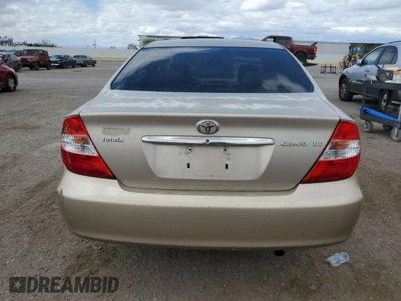 2003 Toyota Camry LE with VIN 4T1BE32K83U241744, listed as a Copart auction lot 55866025 with 200,685 mi miles and Salvage Title. Bid and sale history available at DreamBid. Image 6.