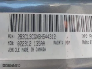 2011 Dodge Charger SE with VIN 2B3CL3CGXBH544312, listed as a IAAI auction lot 41675770 with 209,438 mi miles. Bid and sale history available at carsss.com. Image 9.