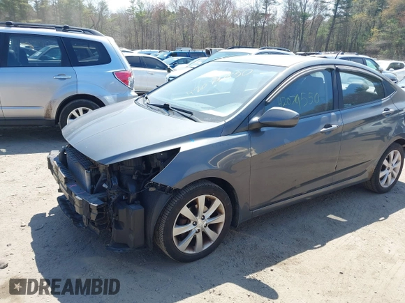 2012 Hyundai Accent GLS with VIN KMHCU4AE9CU167338, listed as a IAAI auction lot 42079550 with 121,889 mi miles. Bid and sale history available at carsss.com. Image 2.