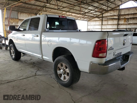 2014 Ram 2500 SLT with VIN 3C6TR5DT0EG309756, listed as a Copart auction lot 51149685 with 163,472 mi miles and Salvage title. Bid and sale history available at DreamBid. Image 2.