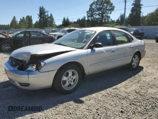 2007 Ford Taurus SE with VIN 1FAFP53U07A126256, listed as a Copart auction lot 64018055 with 135,713 mi miles and Salvage title. Bid and sale history available at DreamBid. Image 1.