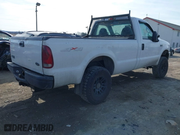1999 Ford Super Duty F-250 XL with VIN 1FTNF21F3XEC26324, listed as a IAAI auction lot 41433149 with 203,634 mi miles. Bid and sale history available at carsss.com. Image 4.
