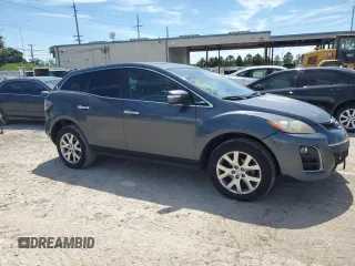 2011 Mazda CX-7 S Grand Touring z VIN JM3ER4D33B0355181, wystawiony jako Copart lot #69687474 z przebiegiem 223 622 mil mil oraz Nie do naprawy • Non repairable. Historia ofert i sprzedaży dostępna na DreamBid. Obrazek 4.