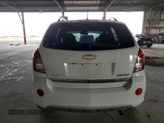 2013 Chevrolet Captiva Sport LTZ with VIN 3GNAL4EK0DS619409, listed as a Copart auction lot 82646974 with 90,590 mi miles and Salvage Title. Bid and sale history available at DreamBid. Image 6.