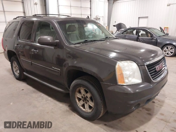 2010 GMC Yukon SLT with VIN 1GKUKCE08AR148548, listed as a IAAI auction lot 41994933 with 248,534 mi miles. Bid and sale history available at carsss.com. Image 1.