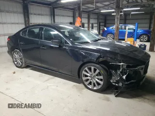 2019 Mazda 3 Premium with VIN 3MZBPAEM7KM102348, listed as a Copart auction lot 84587534 with 73,125 mi miles and Salvage Title. Bid and sale history available at DreamBid. Image 4.