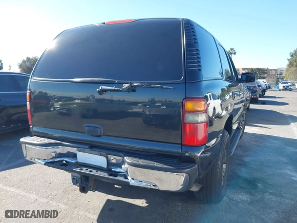 2003 Chevrolet Tahoe LS with VIN 1GNEC13V33R219195, listed as a IAAI auction lot 41342940 with 177,276 mi miles. Bid and sale history available at carsss.com. Image 4.