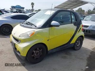 2010 Smart fortwo Pure z VIN WMEEJ3BA2AK365443, wystawiony jako IAAI lot #42293722 z przebiegiem 88 076 mil mil oraz . Historia ofert i sprzedaży dostępna na DreamBid. Obrazek 2.
