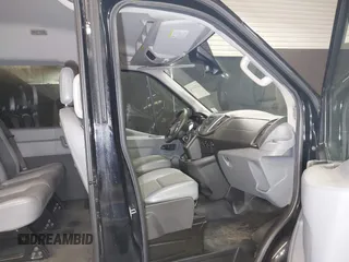 2019 Ford Transit Passenger XL with VIN 1FBAX2CM7KKA64803, listed as a IAAI auction lot 42220187 with 93,853 mi miles and . Bid and sale history available at DreamBid. Image 5.