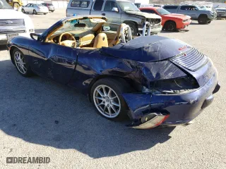 2003 Porsche 911 Carrera with VIN WP0CA29993S653412, listed as a Copart auction lot 85146114 with 50,130 mi miles and Salvage Title. Bid and sale history available at carsss.com. Image 2.
