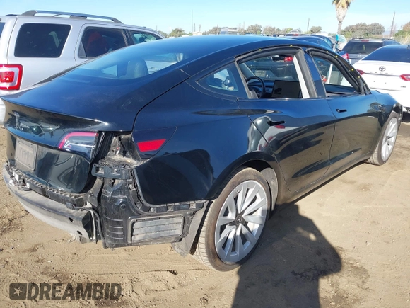 2022 Tesla Model 3 with VIN 5YJ3E1EA9NF295890, listed as a IAAI auction lot 41175917 with 42,230 mi miles and . Bid and sale history available at DreamBid. Image 4.