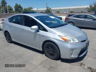 2015 Toyota Prius Four z VIN JTDKN3DU0F0415952, wystawiony jako IAAI lot #42402823 z przebiegiem 272 110 mil mil oraz . Historia ofert i sprzedaży dostępna na DreamBid. Obrazek 1.