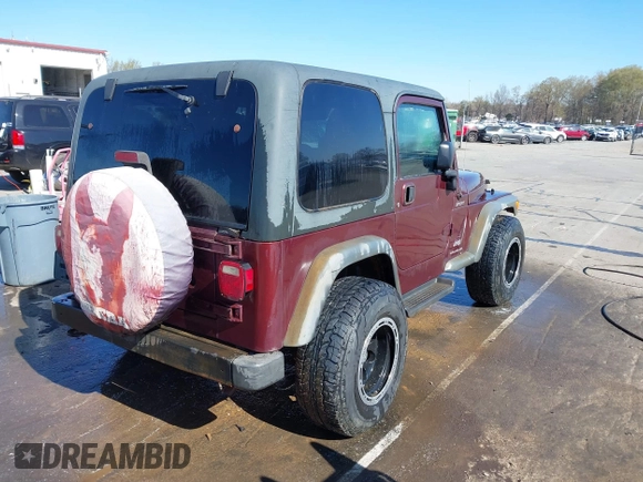 2003 Jeep Wrangler Sport with VIN 1J4FA49S33P345192, listed as a IAAI auction lot 41801344 with 196,472 mi miles. Bid and sale history available at carsss.com. Image 4.