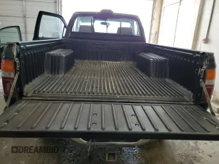 1994 Toyota Pickup DX z VIN 4TARN01P6RZ158609, wystawiony jako Copart lot #66612684 z przebiegiem 230 855 mil mil oraz Szkoda całkowita • Salvage title. Historia ofert i sprzedaży dostępna na DreamBid. Obrazek 10.