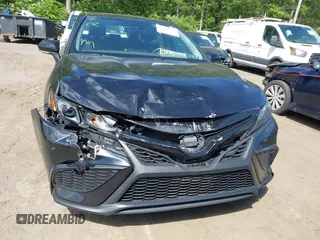 2023 Toyota Camry SE with VIN 4T1G11AK2PU828745, listed as a IAAI auction lot 42193957 with 35,399 mi miles and . Bid and sale history available at carsss.com. Image 12.