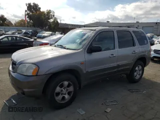 2001 Mazda Tribute LX with VIN 4F2YU09101KM05302, listed as a Copart auction lot 42460555 with 237,122 mi miles and Salvage Title. Bid and sale history available at carsss.com. Image 1.