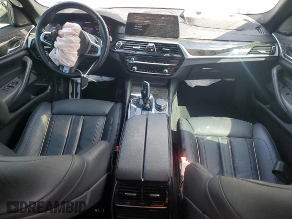 2020 BMW 5 Series M550i xDrive with VIN WBAJS7C03LCD00279, listed as a Copart auction lot 55698035 with 76,057 mi miles and Clean title. Bid and sale history available at DreamBid. Image 8.