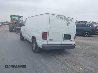 2004 Ford Econoline Cargo with VIN 1FTRE14W94HA16282, listed as a IAAI auction lot 41808947 with Not Provided miles. Bid and sale history available at carsss.com. Image 3.