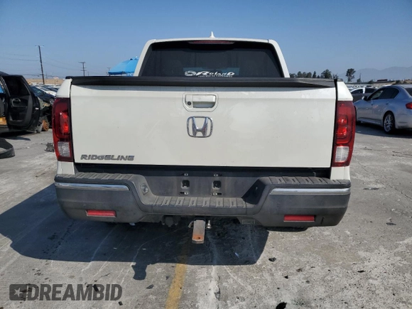 2017 Honda Ridgeline RTL-T with VIN 5FPYK2F65HB011097, listed as a Copart auction lot 63687965 with 186,157 mi miles and Salvage title. Bid and sale history available at DreamBid. Image 6.