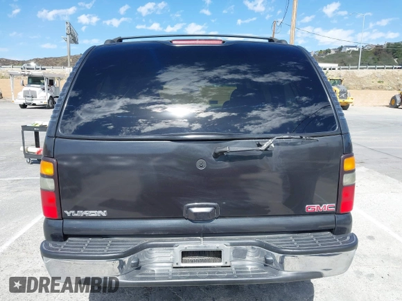 2005 GMC Yukon SLT z VIN 1GKEC13T25J178152, wystawiony jako IAAI lot #41685936 z przebiegiem 226 765 mil mil oraz . Historia ofert i sprzedaży dostępna na DreamBid. Obrazek 16.