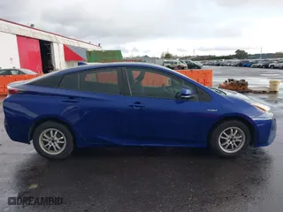 2016 Toyota Prius Two with VIN JTDKBRFUXG3514948, listed as a IAAI auction lot 41777344 with 128,471 mi miles. Bid and sale history available at carsss.com. Image 13.