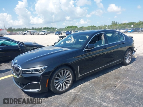 2022 BMW 7 Series 740i with VIN WBA7T2C02NCH73426, listed as a IAAI auction lot 42641007 with 49,300 mi miles and . Bid and sale history available at DreamBid. Image 2.