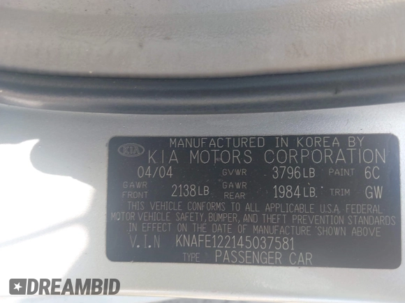 2004 Kia Spectra LX with VIN KNAFE122145037581, listed as a IAAI auction lot 41965681 with 49,817 mi miles. Bid and sale history available at carsss.com. Image 9.