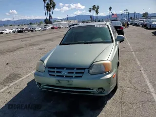 2004 Hyundai Accent GL with VIN KMHCG45C44U533952, listed as a Copart auction lot 51181095 with 88,446 mi miles and Salvage Title. Bid and sale history available at carsss.com. Image 11.