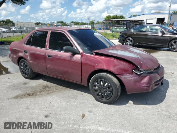 1998 Toyota Corolla VE with VIN 1NXBR12E5WZ041539, listed as a Copart auction lot 61736825 with Not provided miles and Salvage title. Bid and sale history available at DreamBid. Image 4.