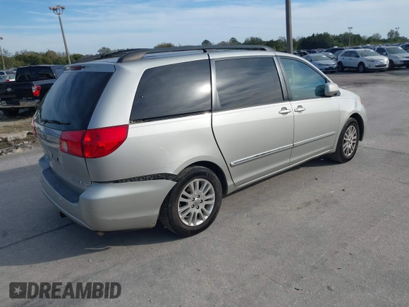 2008 Toyota Sienna XLE with VIN 5TDZK22C18S161339, listed as a IAAI auction lot 41449450 with 202,512 mi miles. Bid and sale history available at carsss.com. Image 4.