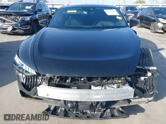 2024 Audi e-tron GT Prestige z VIN WAUEJBFW6R7002606, wystawiony jako IAAI lot #41797047 z przebiegiem 6 184 mil mil oraz . Historia ofert i sprzedaży dostępna na DreamBid. Obrazek 13.