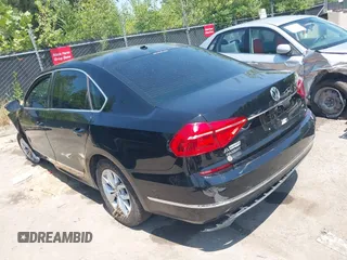 2016 Volkswagen Passat S with VIN 1VWAS7A36GC040993, listed as a IAAI auction lot 40010088 with 105,400 mi miles and . Bid and sale history available at DreamBid. Image 3.