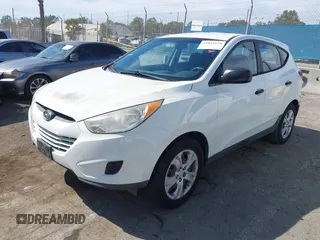 2010 Hyundai Tucson GLS with VIN KM8JT3AC7AU020547, listed as a IAAI auction lot 42014150 with 106,559 mi miles and . Bid and sale history available at DreamBid. Image 2.