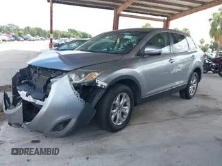 2015 Mazda CX-9 Sport with VIN JM3TB2BA0F0447436, listed as a IAAI auction lot 42480482 with 127,557 mi miles and . Bid and sale history available at DreamBid. Image 20.