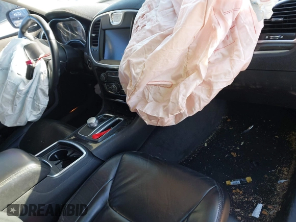 2016 Chrysler 300 Anniversary Edition with VIN 2C3CCAAGXGH261376, listed as a IAAI auction lot 41833894 with 64,489 mi miles and . Bid and sale history available at DreamBid. Image 5.