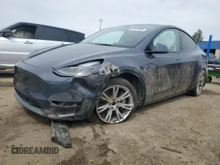 2023 Tesla Model Y Long Range z VIN 7SAYGDEE3PF884220, wystawiony jako Copart lot #52072605 z przebiegiem 44 996 mil mil oraz Tytuł czysty. Historia ofert i sprzedaży dostępna na DreamBid. Obrazek 1.