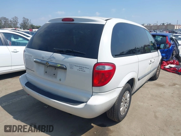 2007 Chrysler Town & Country with VIN 1A4GJ45R97B126697, listed as a IAAI auction lot 42180124 with 186,396 mi miles. Bid and sale history available at carsss.com. Image 4.