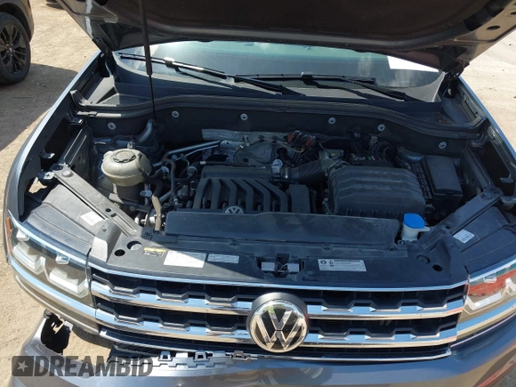 2019 Volkswagen Atlas SEL z VIN 1V2ER2CA5KC555568, wystawiony jako IAAI lot #42050516 z przebiegiem 71 599 mil mil oraz . Historia ofert i sprzedaży dostępna na DreamBid. Obrazek 10.
