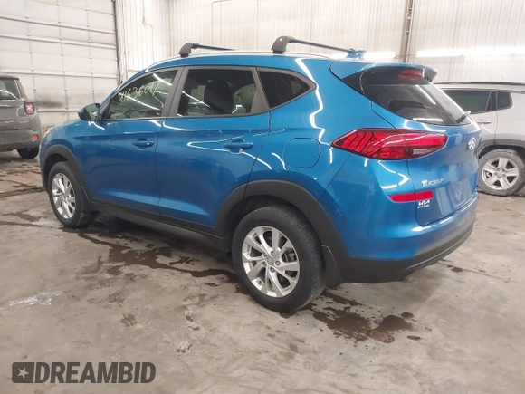 2021 Hyundai Tucson Value with VIN KM8J33A43MU301869, listed as a IAAI auction lot 41636017 with 55,188 mi miles and . Bid and sale history available at DreamBid. Image 3.