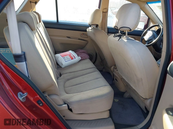 2008 Kia Rondo LX with VIN KNAFG526587147323, listed as a IAAI auction lot 41550909 with 150,967 mi miles. Bid and sale history available at carsss.com. Image 8.