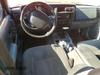 1998 Jeep Cherokee Sport with VIN 1J4FT68S8WL251781, listed as a Copart auction lot 71562574 with 267,648 mi miles and Non Repairable. Bid and sale history available at carsss.com. Image 8.