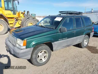 1998 Jeep Grand Cherokee Laredo with VIN 1J4GZ58S5WC362365, listed as a IAAI auction lot 41891397 with 246,673 mi miles. Bid and sale history available at carsss.com. Image 2.