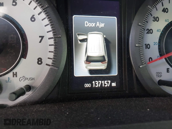 2015 Toyota Sienna SE with VIN 5TDXK3DC0FS657546, listed as a IAAI auction lot 42183750 with 137,157 mi miles and . Bid and sale history available at DreamBid. Image 16.
