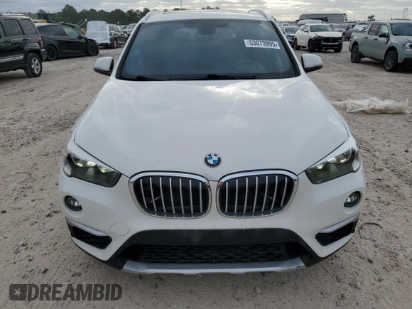 2017 BMW X1 sDrive28i with VIN WBXHU7C37H5H34418, listed as a Copart auction lot 53073995 with 67,980 mi miles and Salvage Title. Bid and sale history available at carsss.com. Image 5.