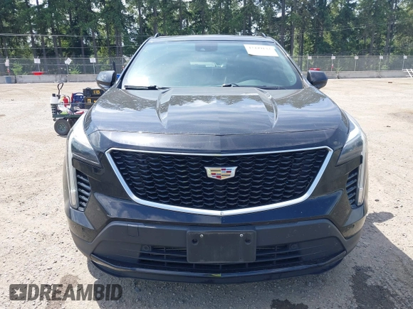 2019 Cadillac XT4 AWD Sport with VIN 1GYFZFR48KF119062, listed as a IAAI auction lot 42449132 with 89,676 mi miles and . Bid and sale history available at DreamBid. Image 12.