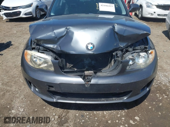 2013 BMW 1 Series 128i with VIN WBAUP7C57DVP25145, listed as a IAAI auction lot 42186423 with 131,222 mi miles and . Bid and sale history available at DreamBid. Image 6.