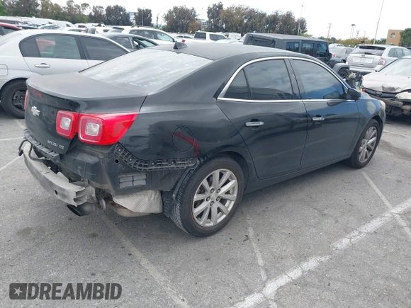 2013 Chevrolet Malibu LTZ with VIN 1G11H5SA2DU125573, listed as a IAAI auction lot 42047422 with 165,493 mi miles and . Bid and sale history available at DreamBid. Image 4.