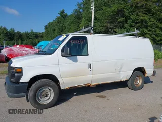 2011 Ford Econoline Cargo Commercial with VIN 1FTNE2EW2BDA58039, listed as a IAAI auction lot 42790590 with 240,510 mi miles and . Bid and sale history available at DreamBid. Image 12.