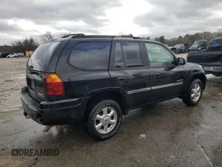 2006 GMC Envoy SLT with VIN 1GKDS13S762258032, listed as a Copart auction lot 88677095 with 184,188 mi miles and Salvage Title. Bid and sale history available at carsss.com. Image 3.